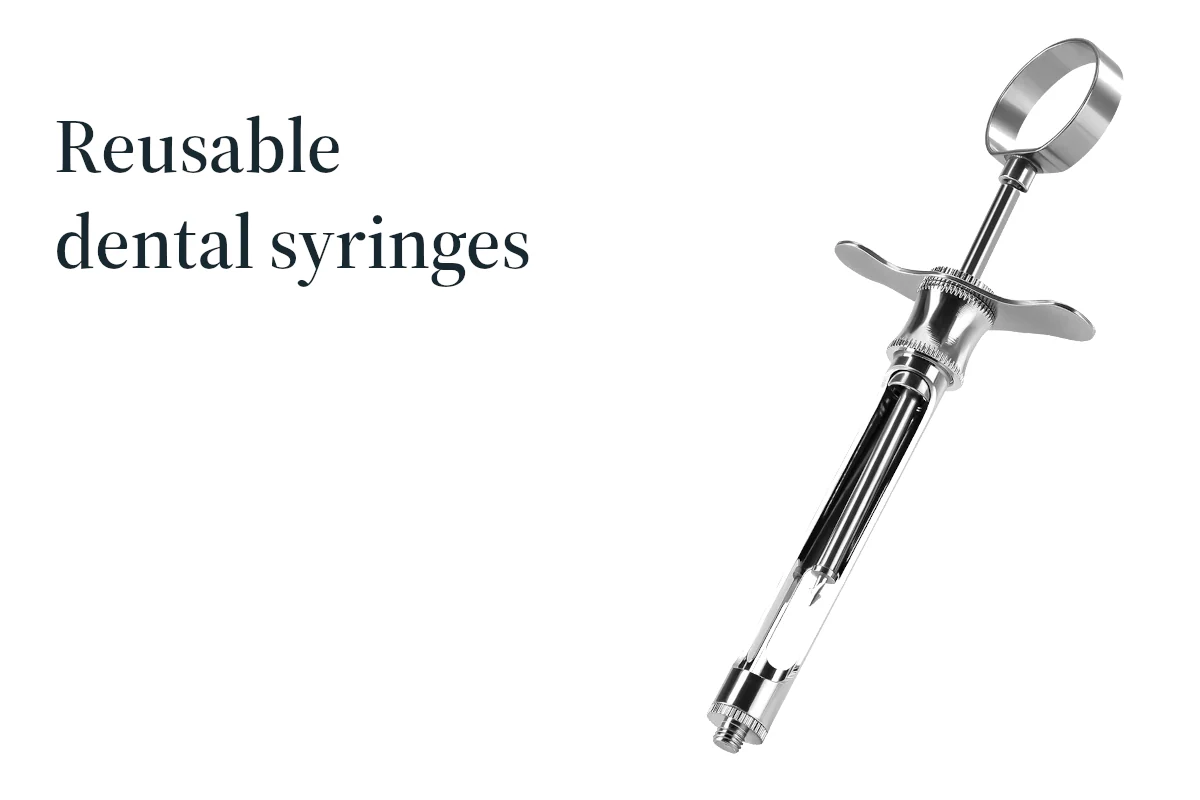 A reusable dental syringe presented to show its barrel, thumb ring and working connection.