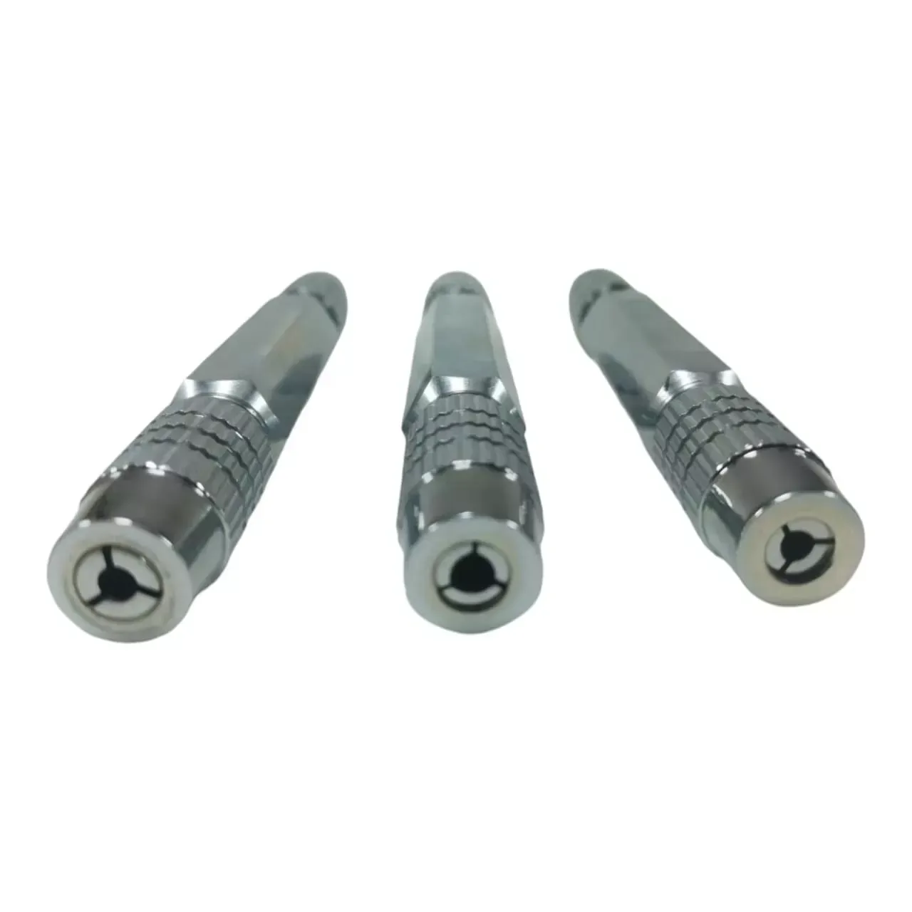 Three examples of the collet-style abutment preparation holder