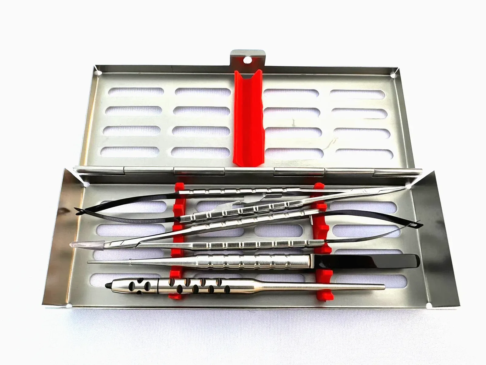 Four-piece dental microsurgery assortment with spring instruments, tweezers and scalpel handle — view 1